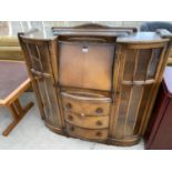 A MAHOGANY SIDE BY SIDE CABINET WITH FALL FRONT, THREE DRAWERS AND TWO GLAZED DOORS