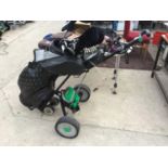 AN ELECTRIC GOLF BUGGY WITH HILL BILLY CHARGER AND BATTERY IN WORKING ORDER AND A BAG OF GOLF