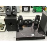 A SONY RECORD DECK WITH VARIOUS SURROUND SOUND LOGITECH SPEAKERS IN WORKING ORDERS