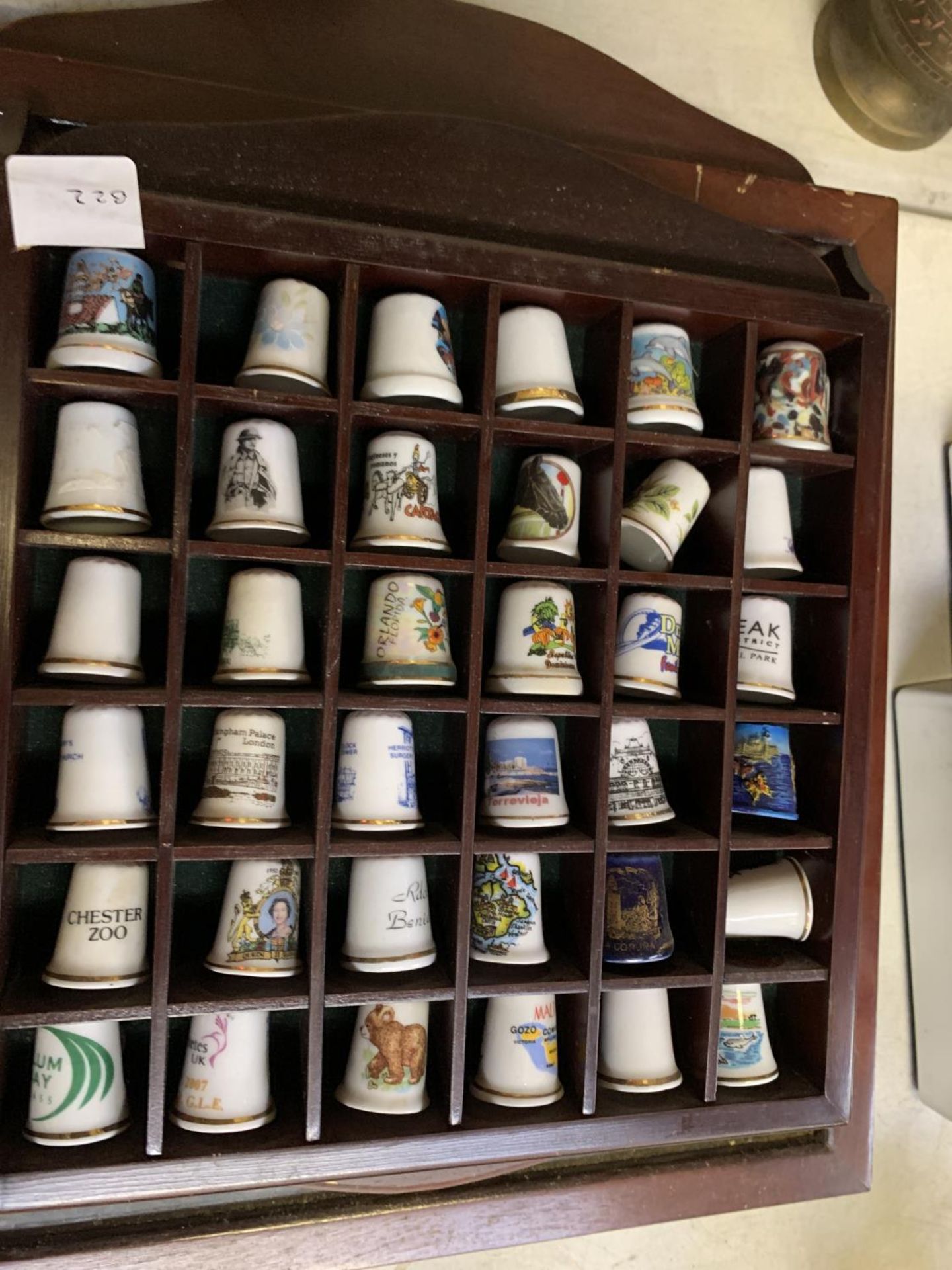 A LARGE COLLECTION OF CERAMIC THIMBLES IN DISPLAY CASES - Image 3 of 4