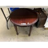 A MAHOGANY CIRCULAR SIDE TABLE WITH CARVED DETAILING TO LEGS AND SIDES