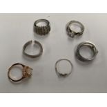 A COLLECTION OF SIX SILVER RINGS