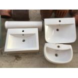 THREE WHITE WASH BASINS AND A PEDESTAL STAND