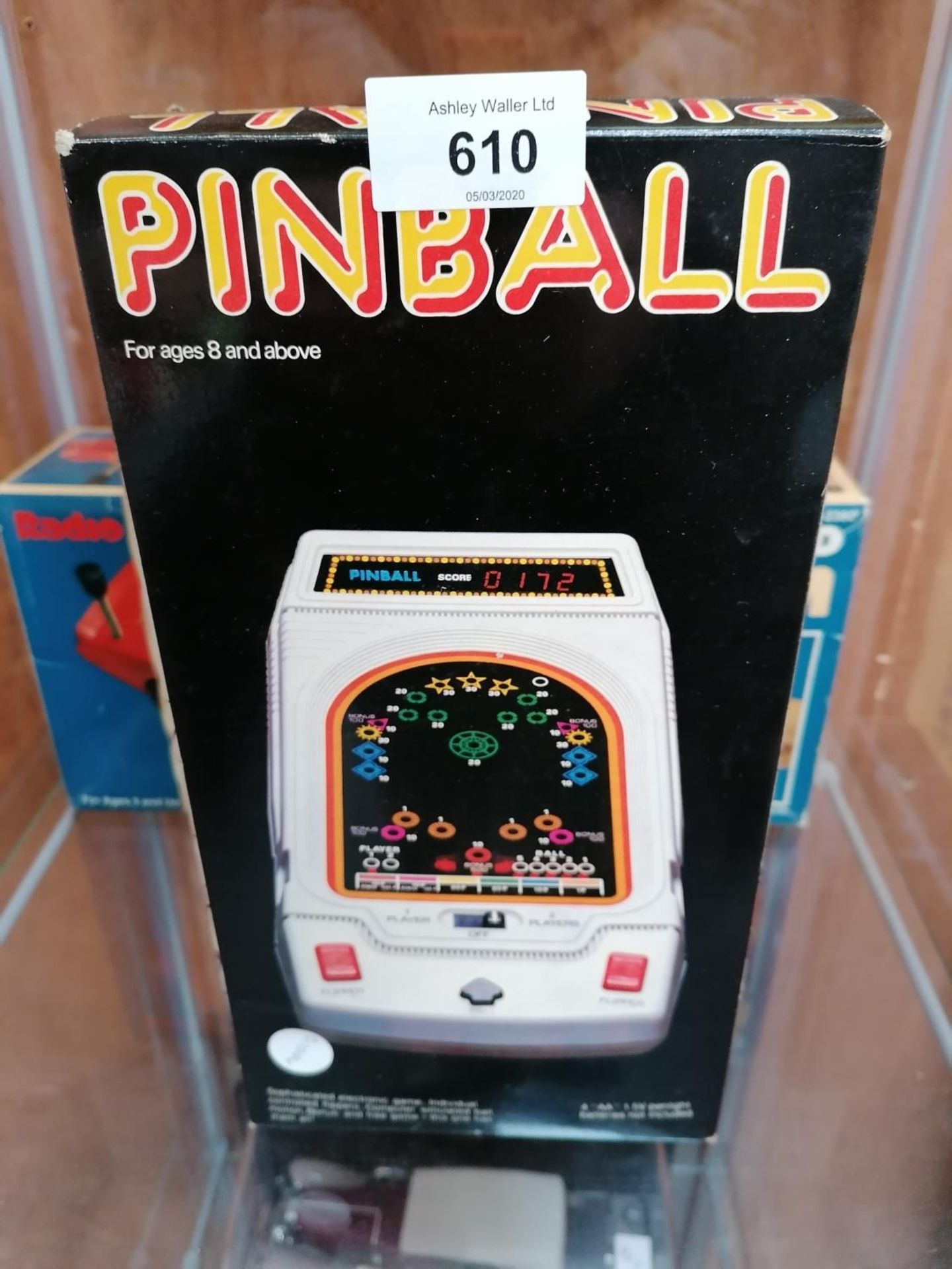 A VINTAGE BOXED BATTERY OPERATED PINBALL MACHINE
