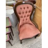 A MAHOGANY BUTTON BACK NURSING CHAIR