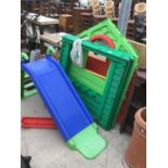 A LITTLE TIKES WENDY HOUSE (COMPLETE WITH ATTACHMENT PIECES) AND A CHILDS SLIDE