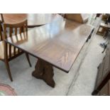 A RECTANGULAR OAK REFECTORY DINING TABLE WITH PEGGED LOWER STRETCHER RAIL