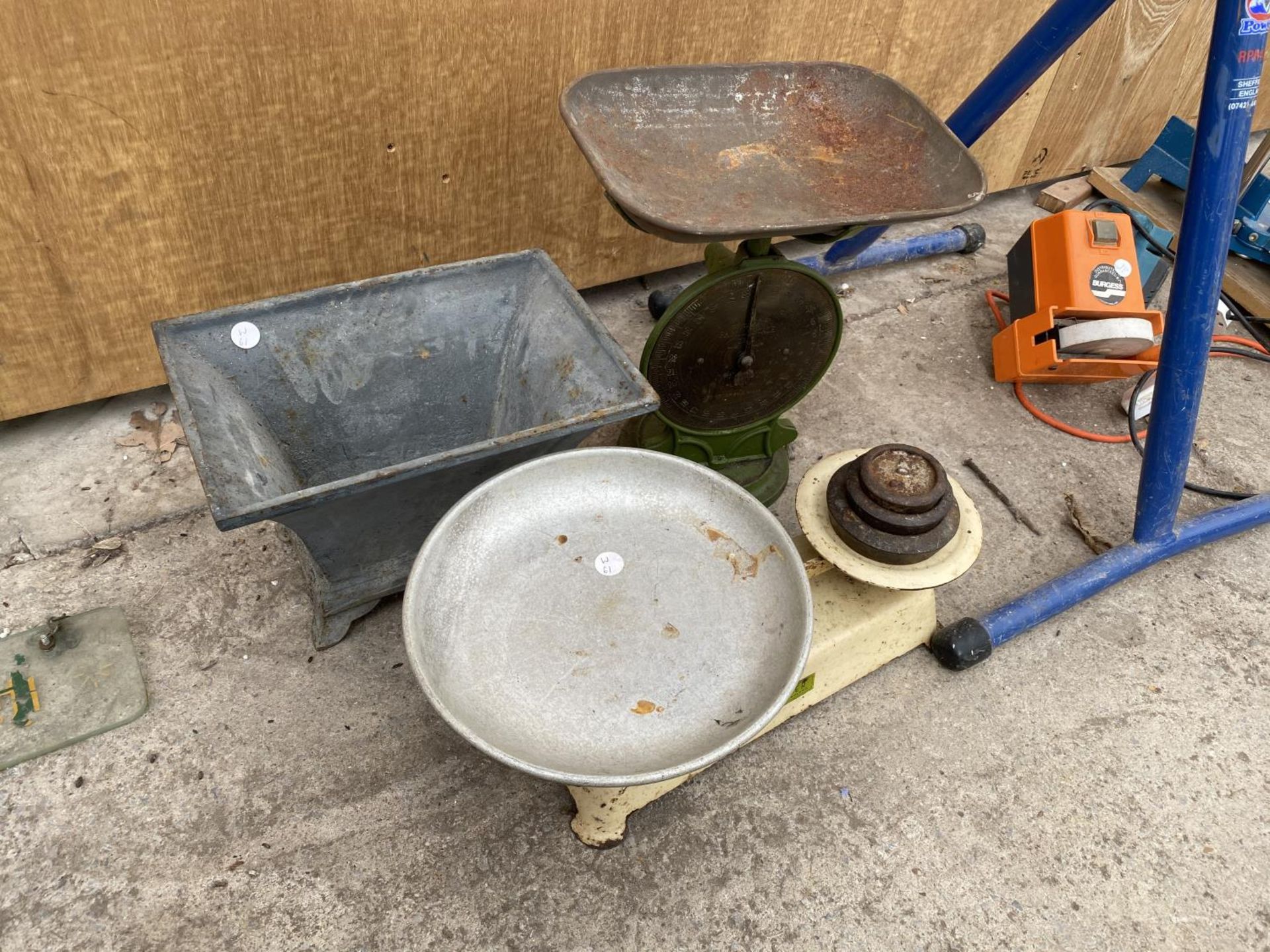 A SMALL CAST IRON TROUGH AND TWO SETS OF VINTAGE SCALES