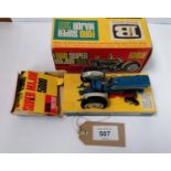 A BRITAINS TOYS FORD SUPER MAJOR 5000 TRACTOR IN ORIGINAL BOX - MODEL NUMBER 9527