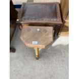 A TREE LEGGED ELM STOOL AND A SMALL OAK STOOL WITH HINGED LID AND LEATHER SEAT