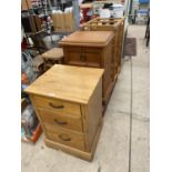 TWO BEDSIDE CHESTS OF THREE DOORS (ONE OAK, ONE PINE) AND A SLATTED BEECH STAND