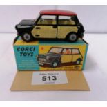 A CORGI TOYS MINI-COOPER WITH DE-LUXE WICKERWORK PANELS AND RED TOP, BOXED, MODEL NUMBER 249