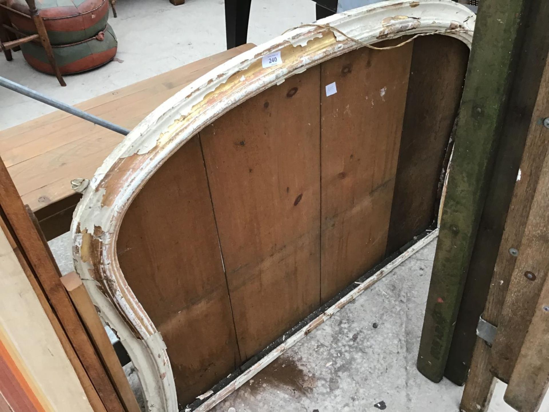 A VINTAGE WOODEN ARCHED FRAME