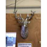 A LARGE CHROME STYLE WALL HANGING DEER HEAD