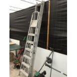 TWO SETS OF ALUMINIUM LADDERS TO INCLUDE A SIX RUNG STEP LADDER AND A TWENTY RUNG TWO SECTION LADDER