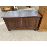 A VICTORIAN OAK MULE CHEST WITH HINGED TOP