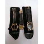 THREE FASHION WRIST WATCHES WITH BLACK STRAPS