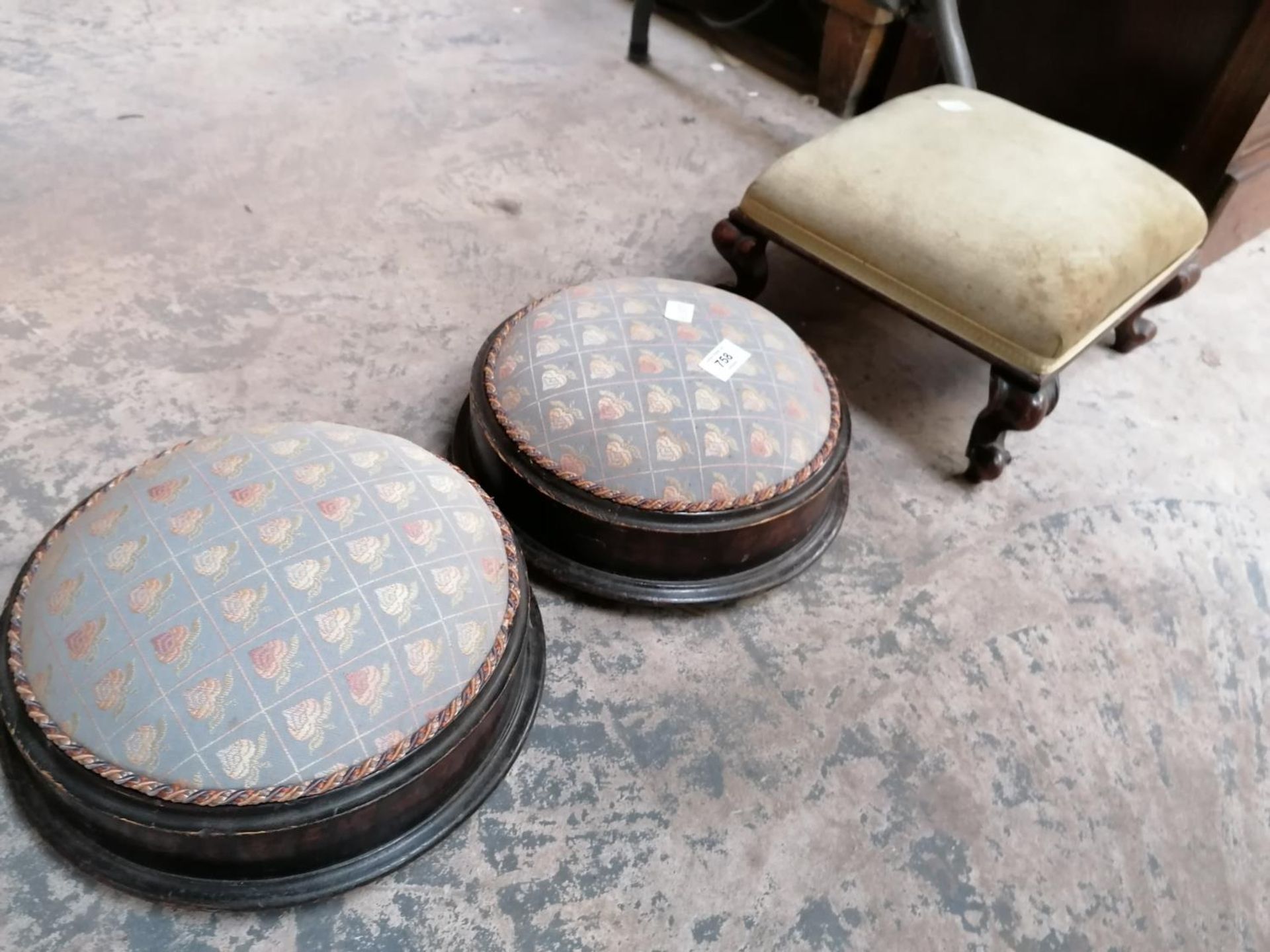 THREE UPHOLSTERED AND MAHOGANY FOOTSTOOLS