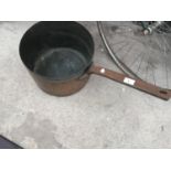 A VERY LARGE COPPER PAN