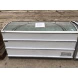 A LARGE SHOP CHEST FREEZER REGULARLY MAINTAINED AND IN CLEAN AND WORKING ORDER