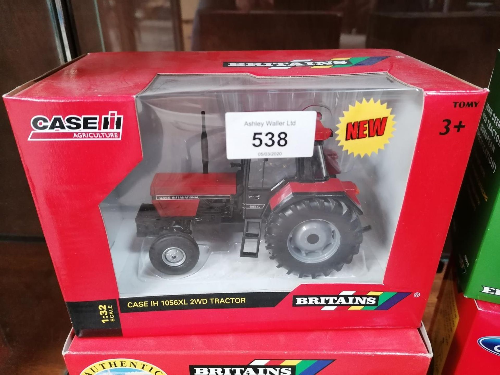 A BRITAINS BOXED DIE CAST CASE INTERNATIONAL 2WD 1056X TRACTOR MODEL, REF NO. 42793