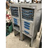 A PAIR OF HEAVY DUTY METAL STORAGE UNITS WITH DRAWERS AND TRAYS