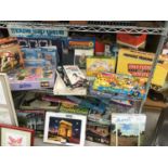 A LARGE COLLECTION OF GAMES AND JIGSAWS TO INCLUDE CONNECT 4, HUNGRY TROLL, DOUBLE CROSS, RACE