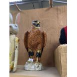 A LARGE CAPODIMONTE ITALIAN CERAMIC GOLDEN EAGLE MODEL, A/F TO BASE