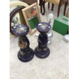 A PAIR OF ORNATE PEDESTAL STANDS AND A CHROME STYLE TABLE LAMP