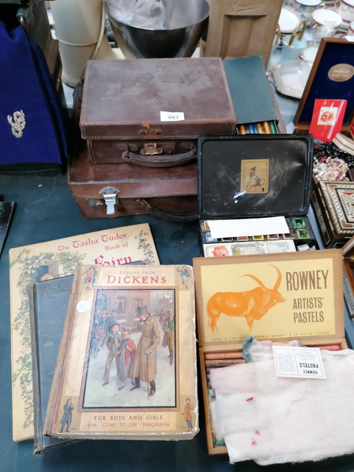 A MIXED GROUP OF ITEMS TO INCLUDE SUITCASE, VINTAGE BOOKS, PAINTS ETC