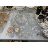 A COLLECTION OF CRYSTAL GLASSWARE TO INCLUDE PUNCH BOWL AND GLASSES, DECANTERS ETC