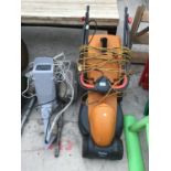A FLYMO RE320 LAWNMOWER IN WORKING ORDER, TWO OUTSIDE LIGHTS AND A SECURITY CAMERA