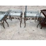 TWO SQUARE GLASS TOP SIDE TABLES WITH ORNATE METAL SUPPORTS