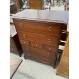 A STAG MINSTREL MAHOGANY CHEST OF THREE SMALL AND FOUR LONG DRAWERS