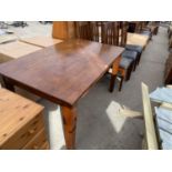 A RECTANGULAR INDONESIAN WOOD DINING TABLE WITH PARQUET STYLE TOP AND SIX HIGH BACK DINING CHAIRS