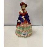 A ROYAL DOULTON 'A VICTORIAN LADY' CERAMIC FIGURE