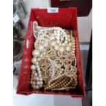 A BOX OF ASSORTED PEARL STYLE NECKLACES ETC