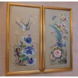A PAIR OF NEEDLEWORK PICTURES OF BIRDS, FRAMED AND GLAZED 65 X 29 CM