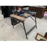 A WORKBENCH AND TWO CASED POWER TOOLS TO INCLUDE A JIGSAW AND A CHAMPION 1010W ROUTER CR1010 IN