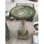 A CONCRETE BIRD BATH