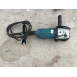 A MAKITA ANGLE GRINDER IN WORKING ORDER