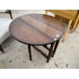 AN OAK DROP LEAF OCCASIONAL TABLE