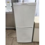 A CANDY FRIDGE FREEZER IN CLEAN AND WORKING ORDER