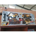 A LARGE BOXED CAT CONSTRUCTION EXPRESS TRAIN SET