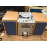 A GRUNDIG MINI HIFI WITH SPEAKERS IN WORKING ORDER