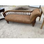 A VICTORIAN CARVED MAHOGANY CHAISE LONGUE