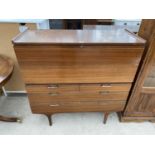 A RETRO TEAK BUREAU WITH FALL FRONT, TWO SHORT AND TWO LONG DRAWERS