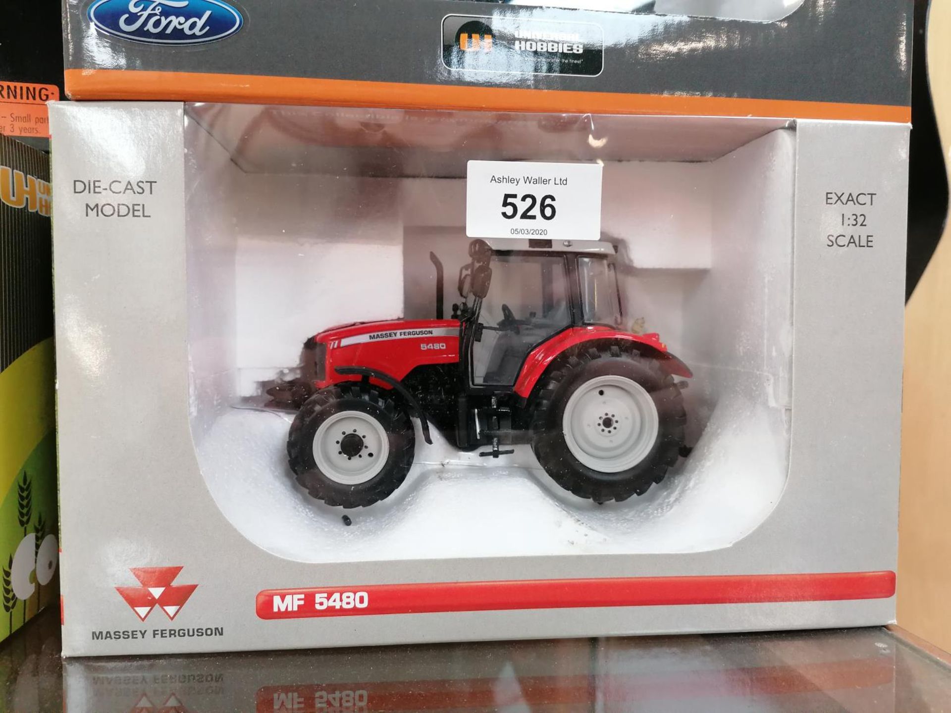 A BOXED DIE CAST UNIVERSAL HOBBIES MASSEY FERGUSON 5480 TRACTOR MODEL, REF NO. 2740