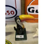 A CAST IRON GUINNESS TOUCAN MODEL