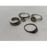 A COLLECTION OF FOUR ASSORTED SILVER RINGS